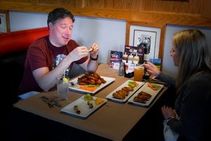 Firehouse Tap and Grille two people eating 